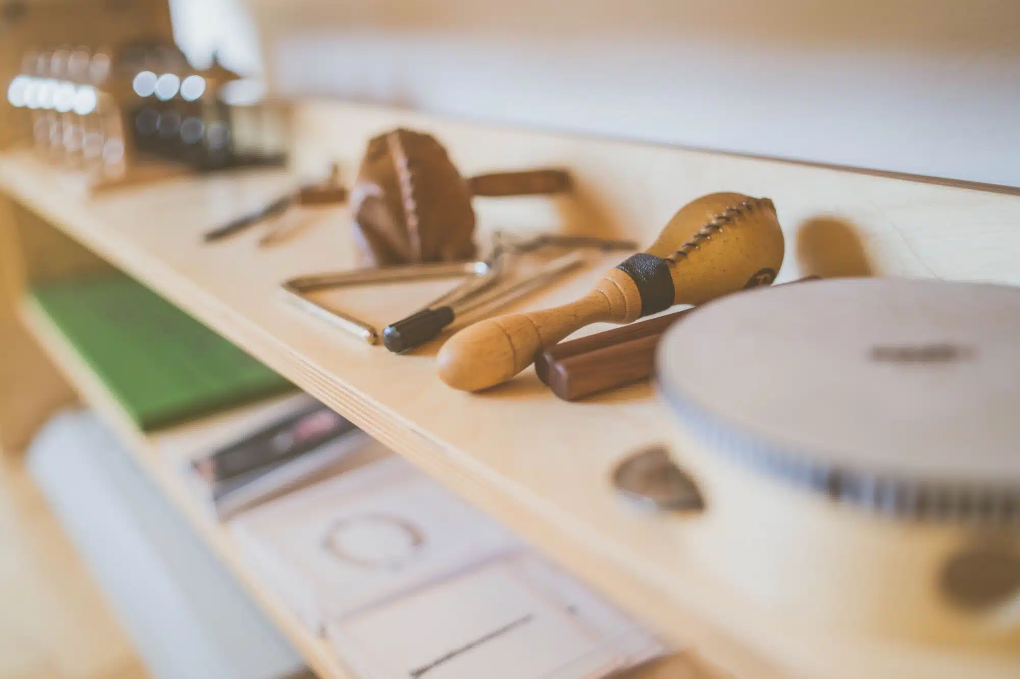 Montessori materials on a classroom shelf